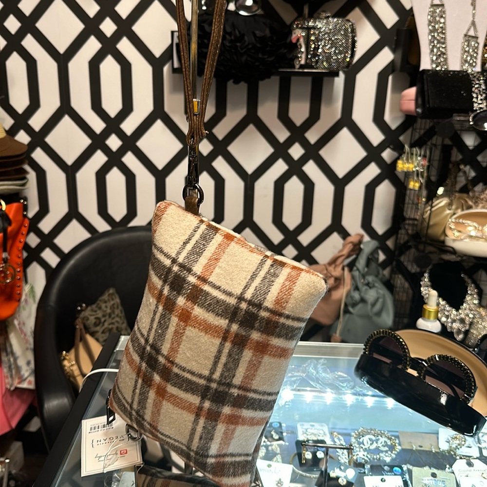 A vehan plaid clutch handbag